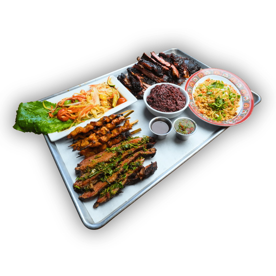 Rocky's Picnic platter with Hmong brisket, ribs, skewers, papaya salad, fried rice and sticky rice